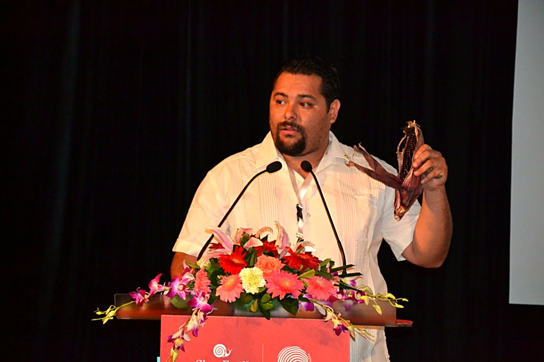 Alfonso Rocha Robles presenting native corn at an international conference
